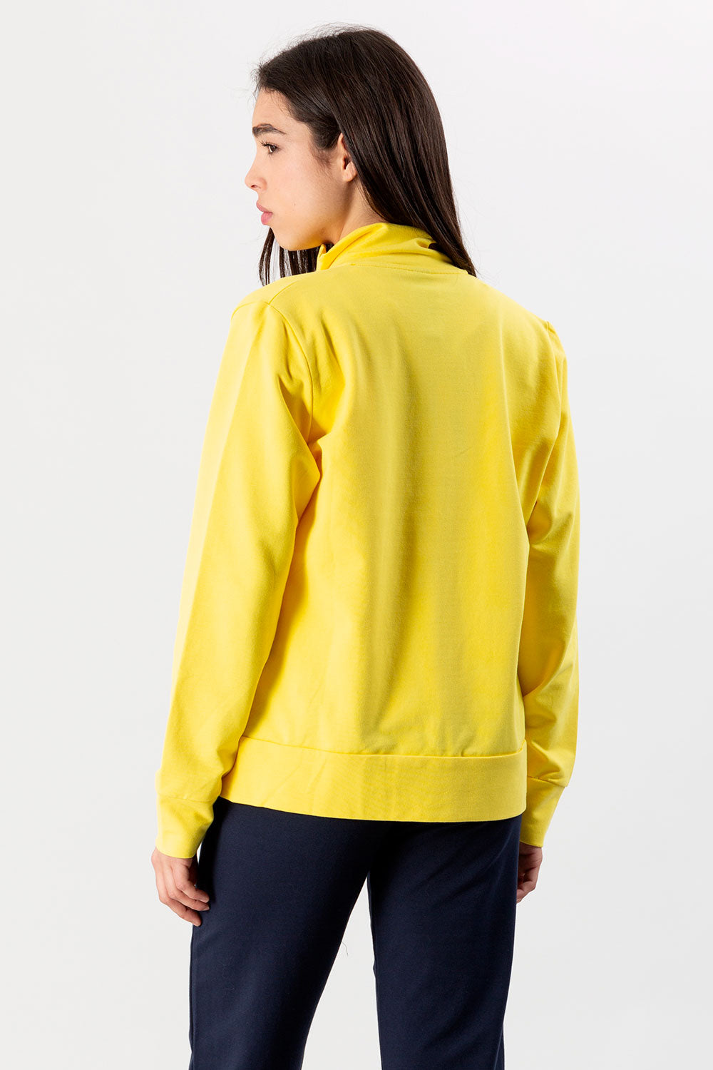 TUTA CON GIACCA A COLLO ALTO