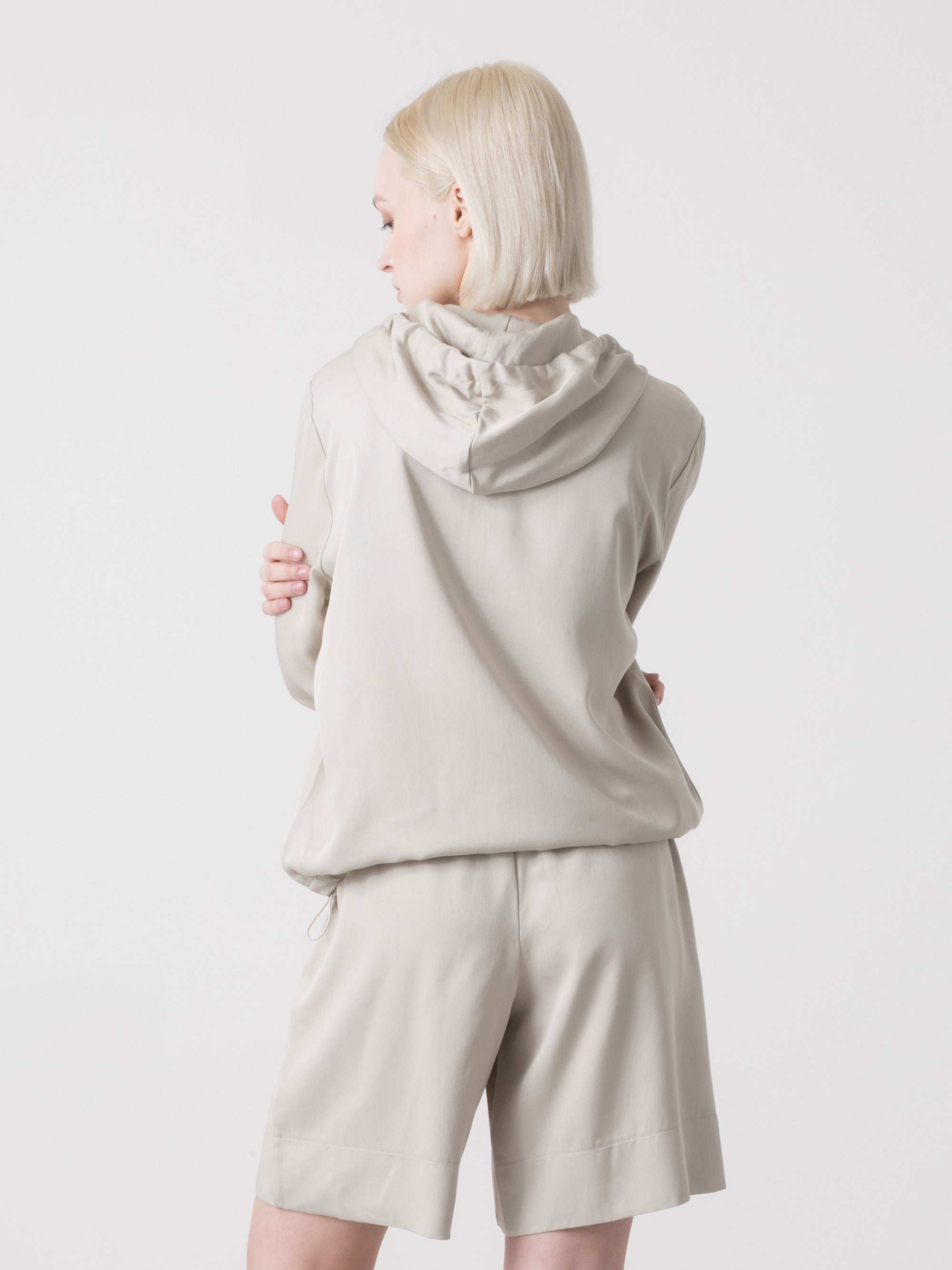 DÁMSKÁ MIKINA DIMENSIONE DANZA S KAPUCÍ A CELOROZEPÍNACÍM ZIPEM Z TENCELU